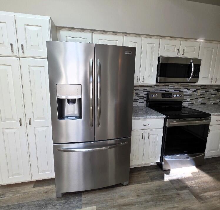 176 Long Rapids Road Alpena, MI 49707 - Photo 5 of 38 Beautiful stainless steel appliances