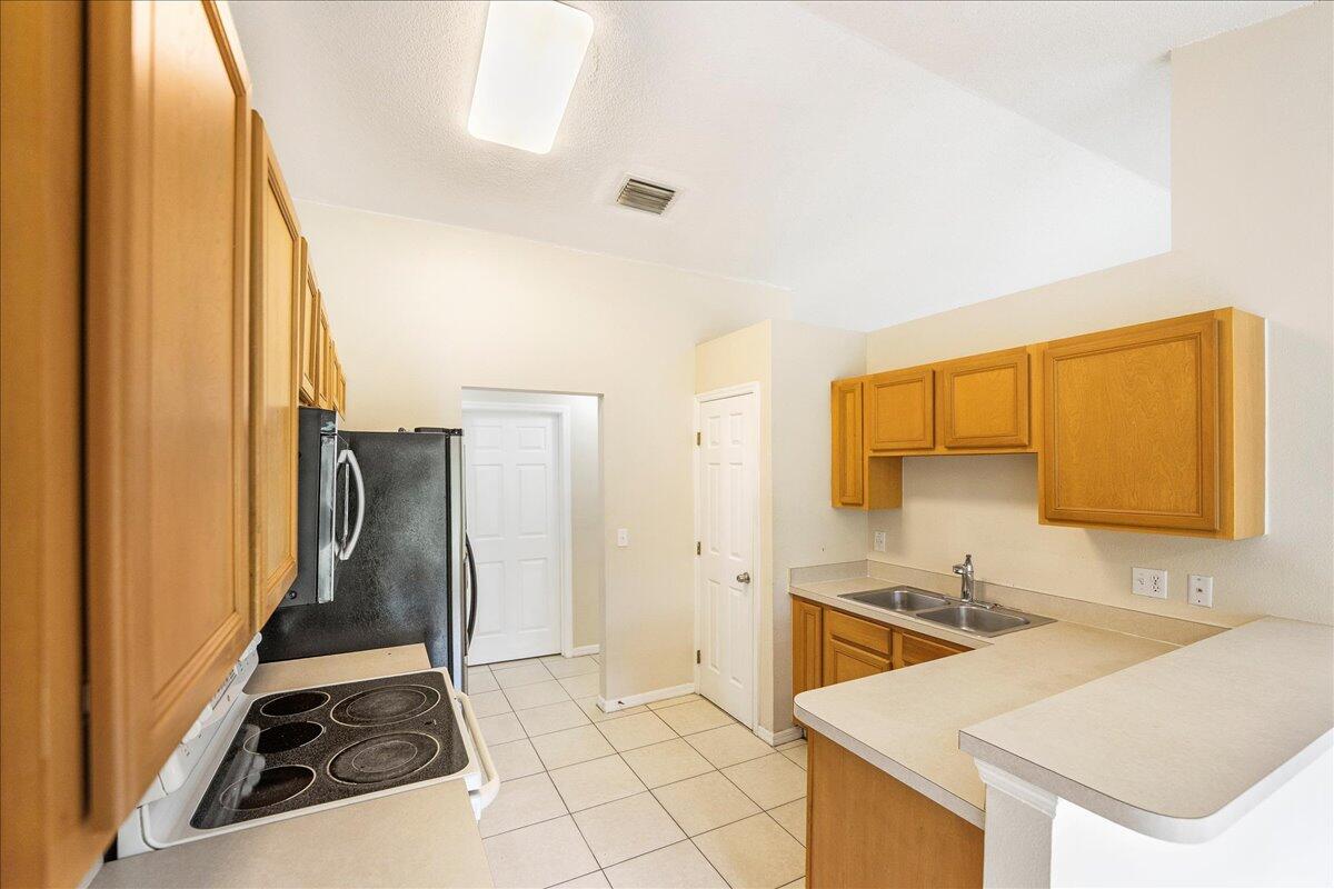 291 Southwest Covington Road Port St. Lucie, FL 34953 - Photo 5 of 27 07-DSC5410