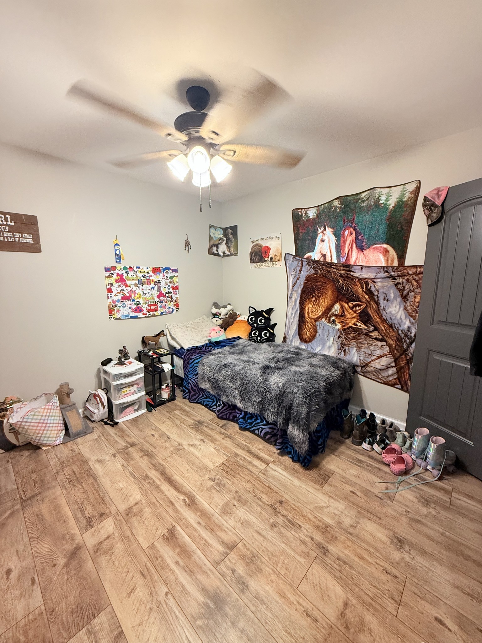 695 Hog Back Ridge Road Bethpage, TN 37022 - Photo 15 of 19 a bedroom with furniture and a chandelier