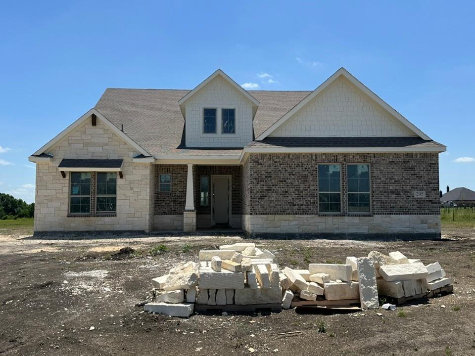 295 Brown Road Leonard, TX 75452 - Photo 1 of 26 New construction residence featuring a combination of light-colored stone and brick veneer exterior