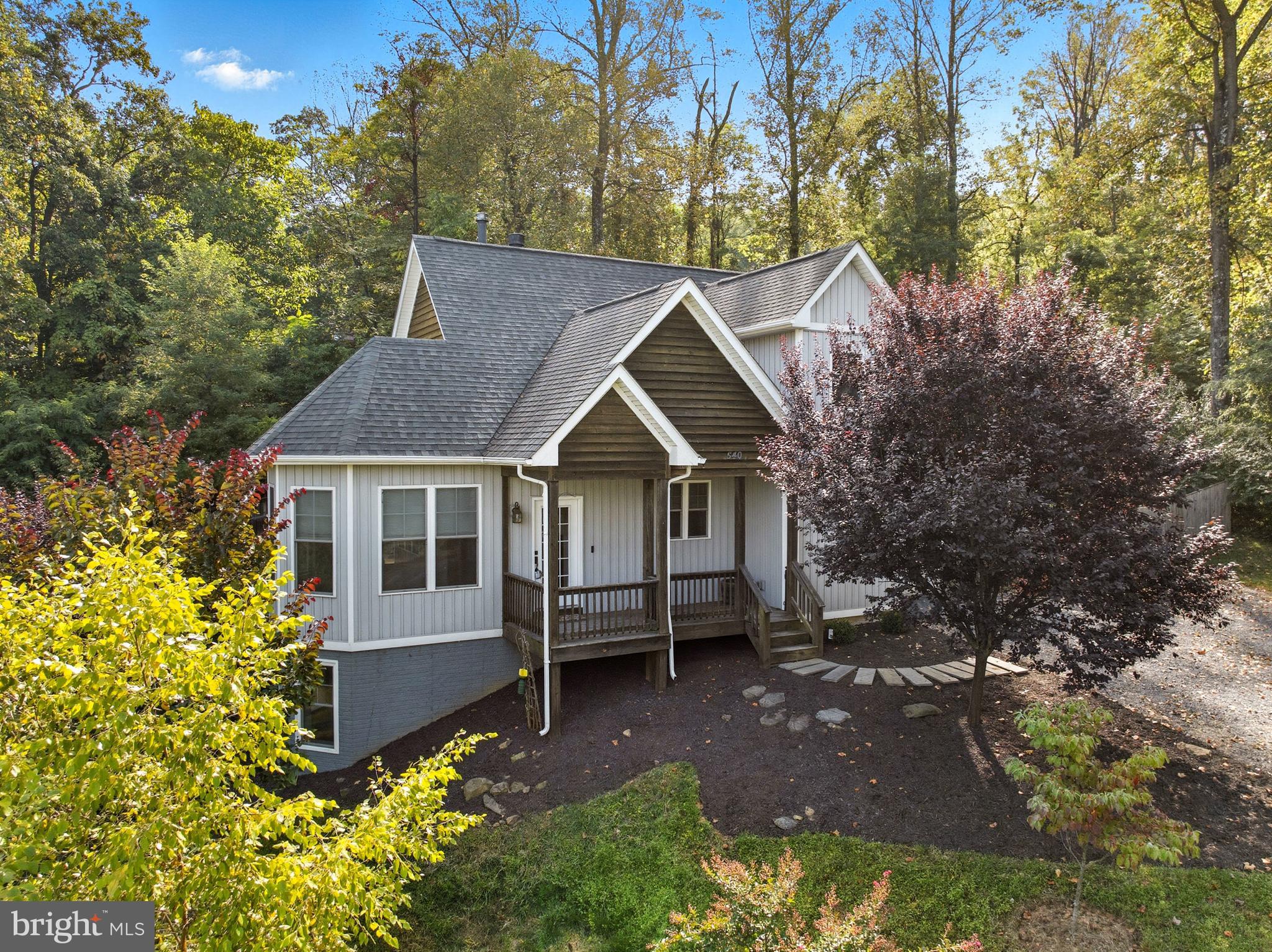 540 Mcdonalds Farm Road Linden, VA 22642 - Photo 1 of 60 a view of house with a yard and potted plants