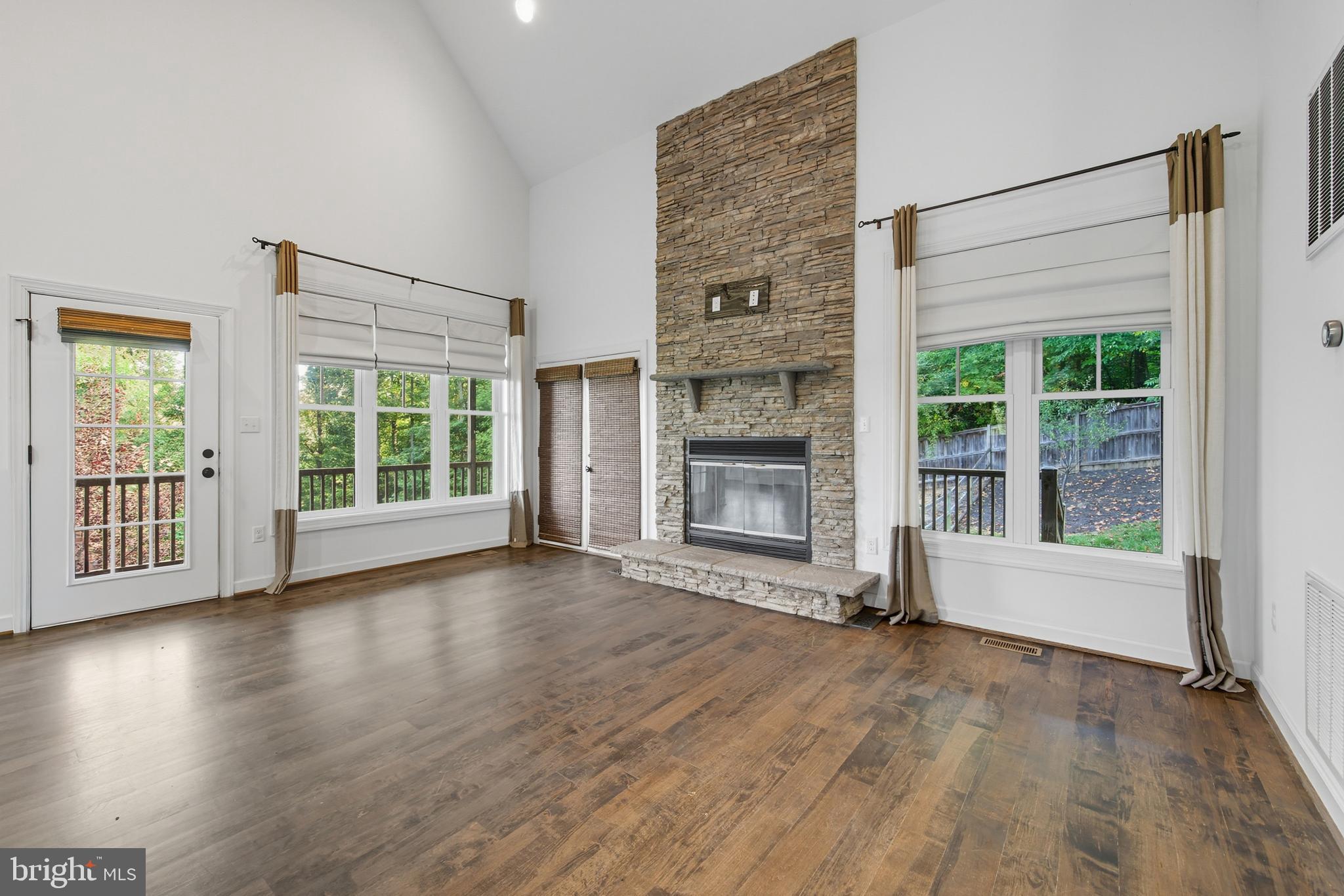 540 Mcdonalds Farm Road Linden, VA 22642 - Photo 22 of 60 a view of an empty room with wooden floor and a window