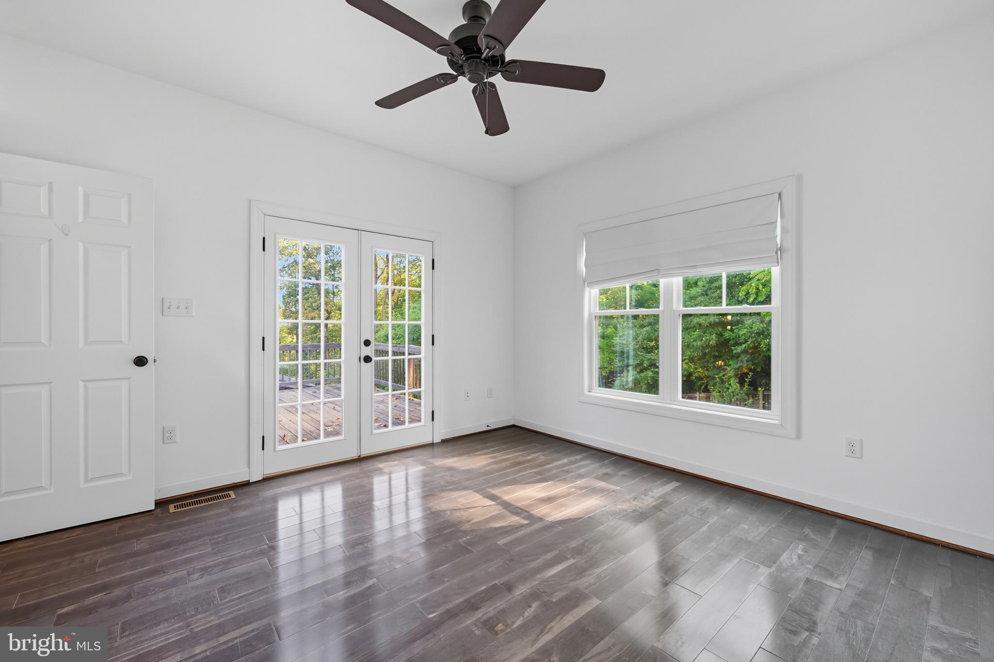 540 Mcdonalds Farm Road Linden, VA 22642 - Photo 38 of 60 a view of an empty room with wooden floor and a window