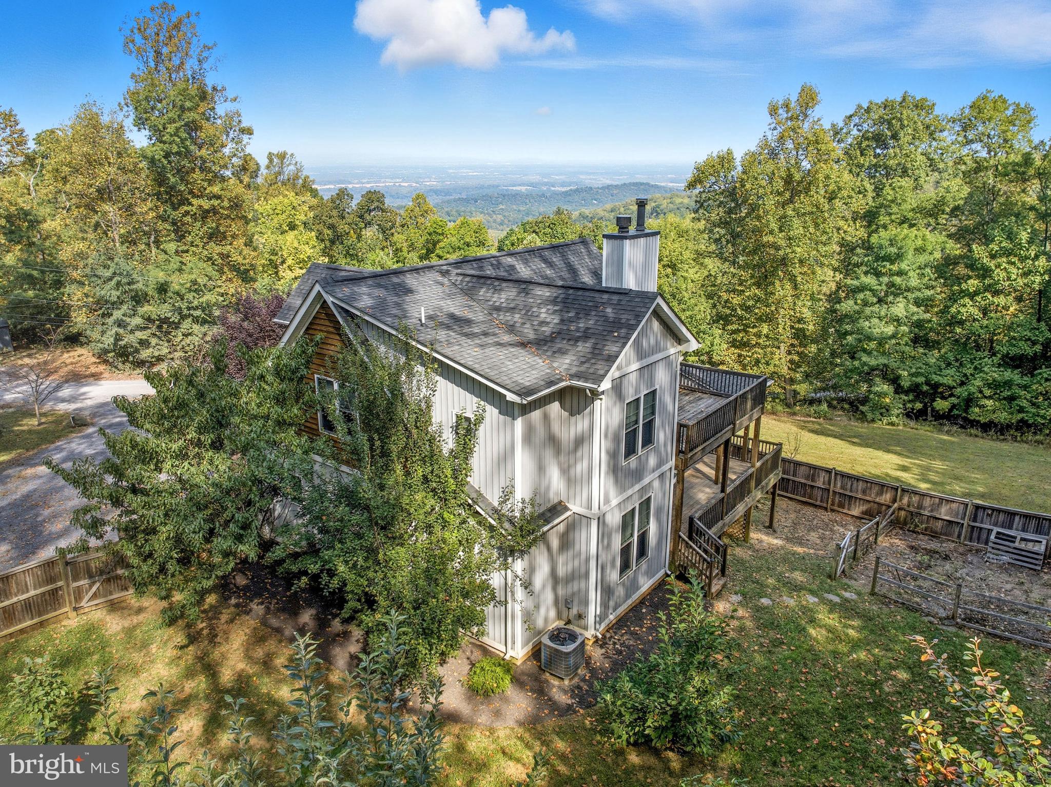 540 Mcdonalds Farm Road Linden, VA 22642 - Photo 4 of 60 a view of a house with a yard
