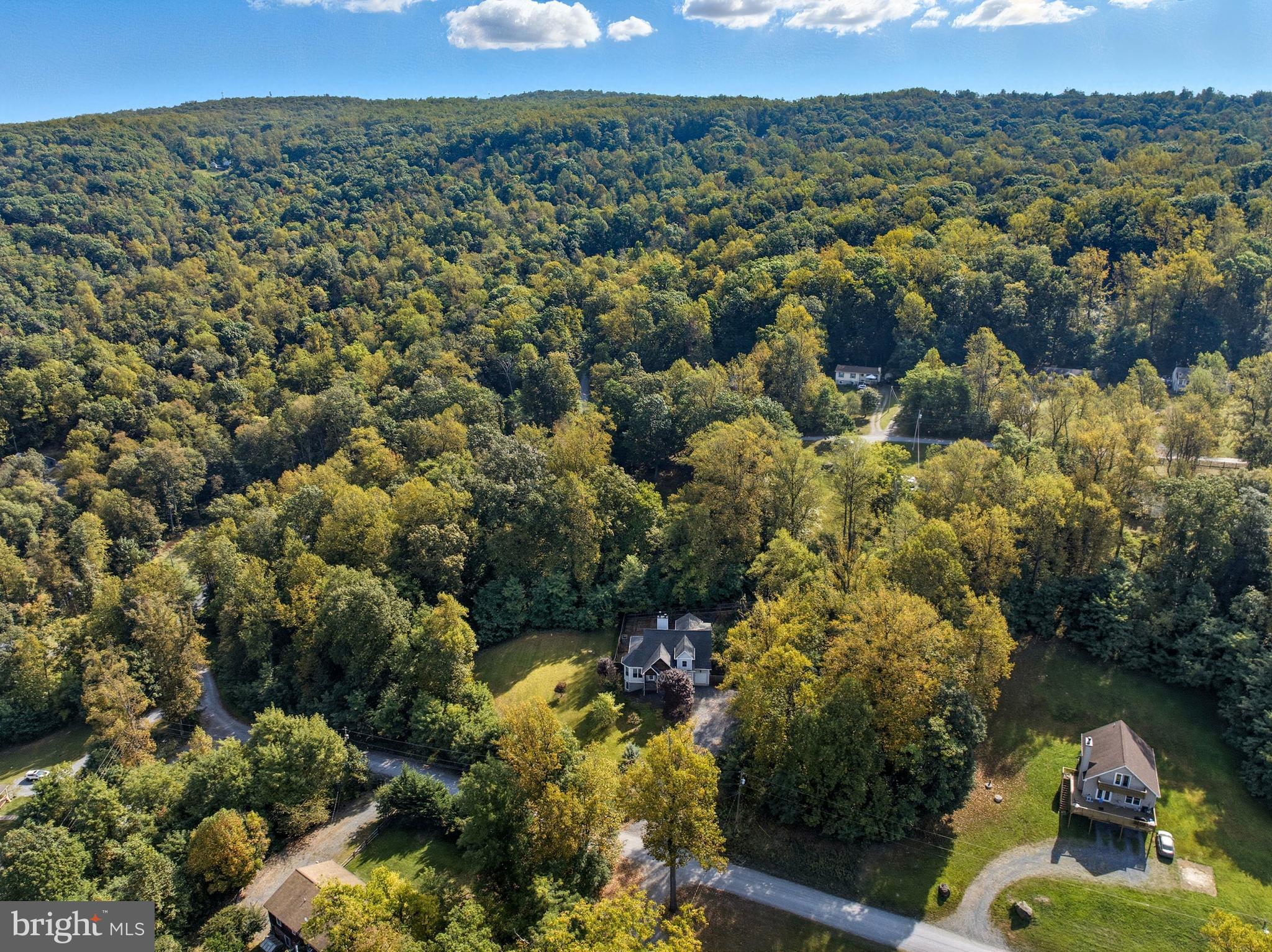 540 Mcdonalds Farm Road Linden, VA 22642 - Photo 8 of 60 an aerial view of a house with a yard