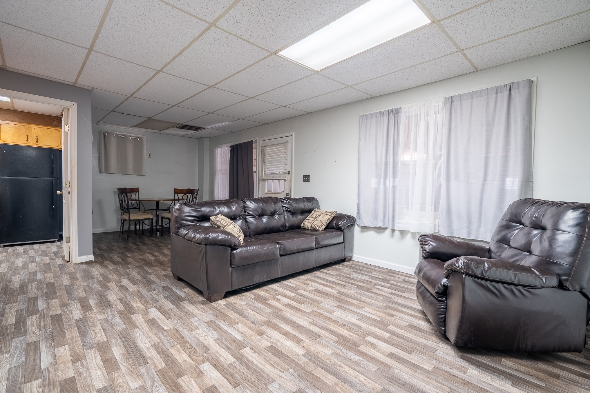 75 Buie Road Summertown, TN 38483 - Photo 15 of 27 a living room with furniture and a wooden floor