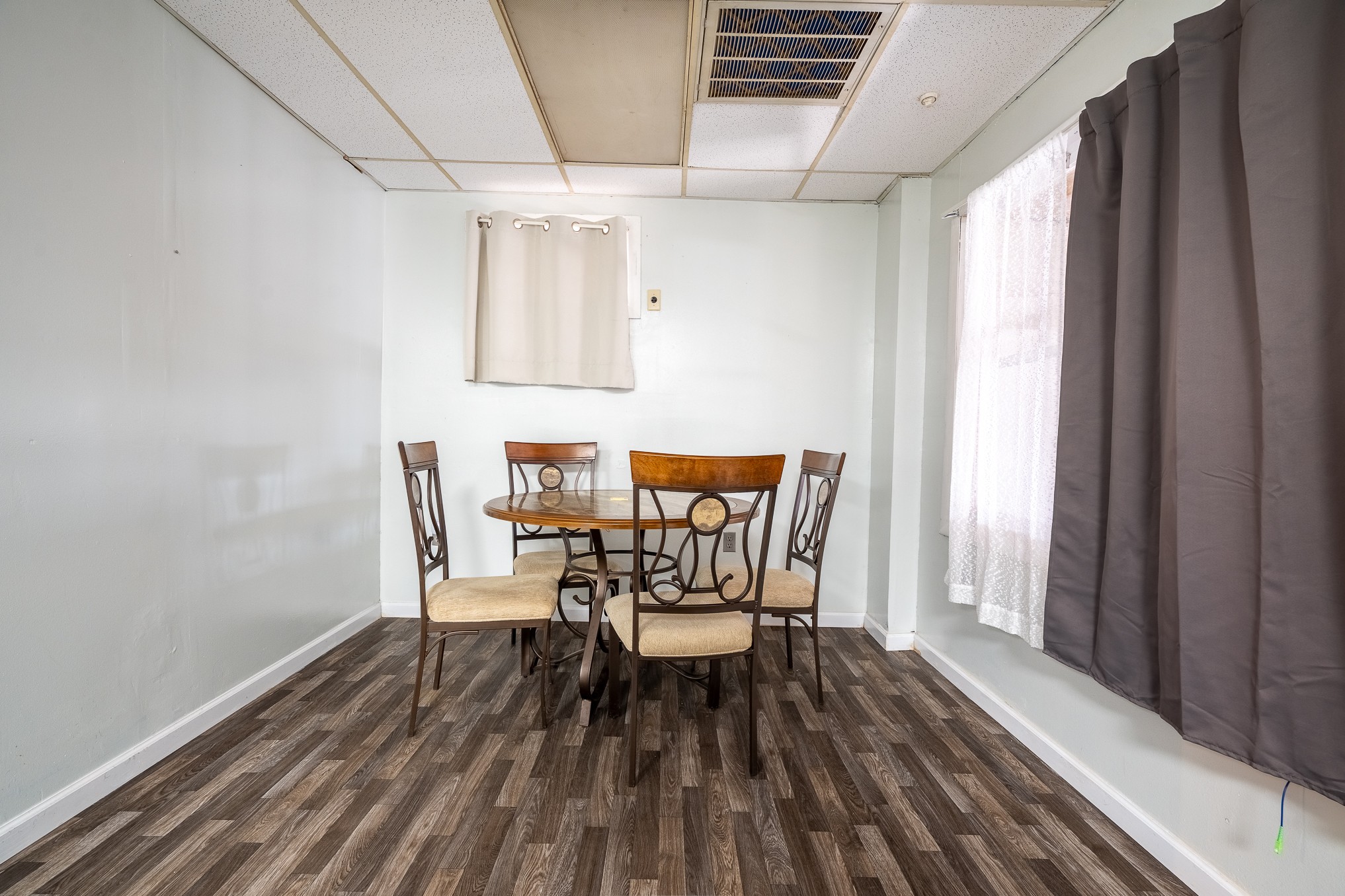 75 Buie Road Summertown, TN 38483 - Photo 17 of 27 a dining room with furniture and wooden floor