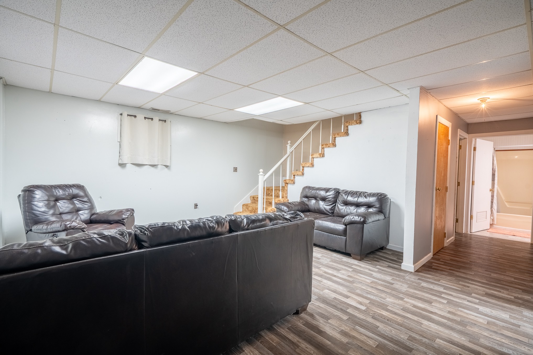 75 Buie Road Summertown, TN 38483 - Photo 18 of 27 a living room with furniture and wooden floor