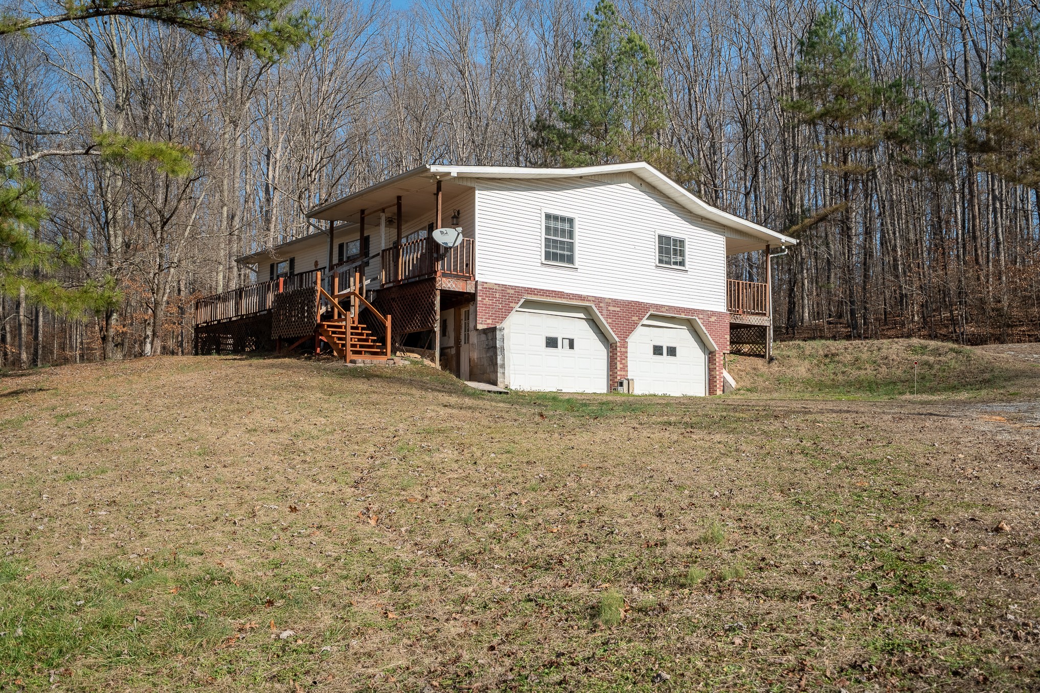 75 Buie Road Summertown, TN 38483 - Photo 2 of 27 a view of a house with backyard