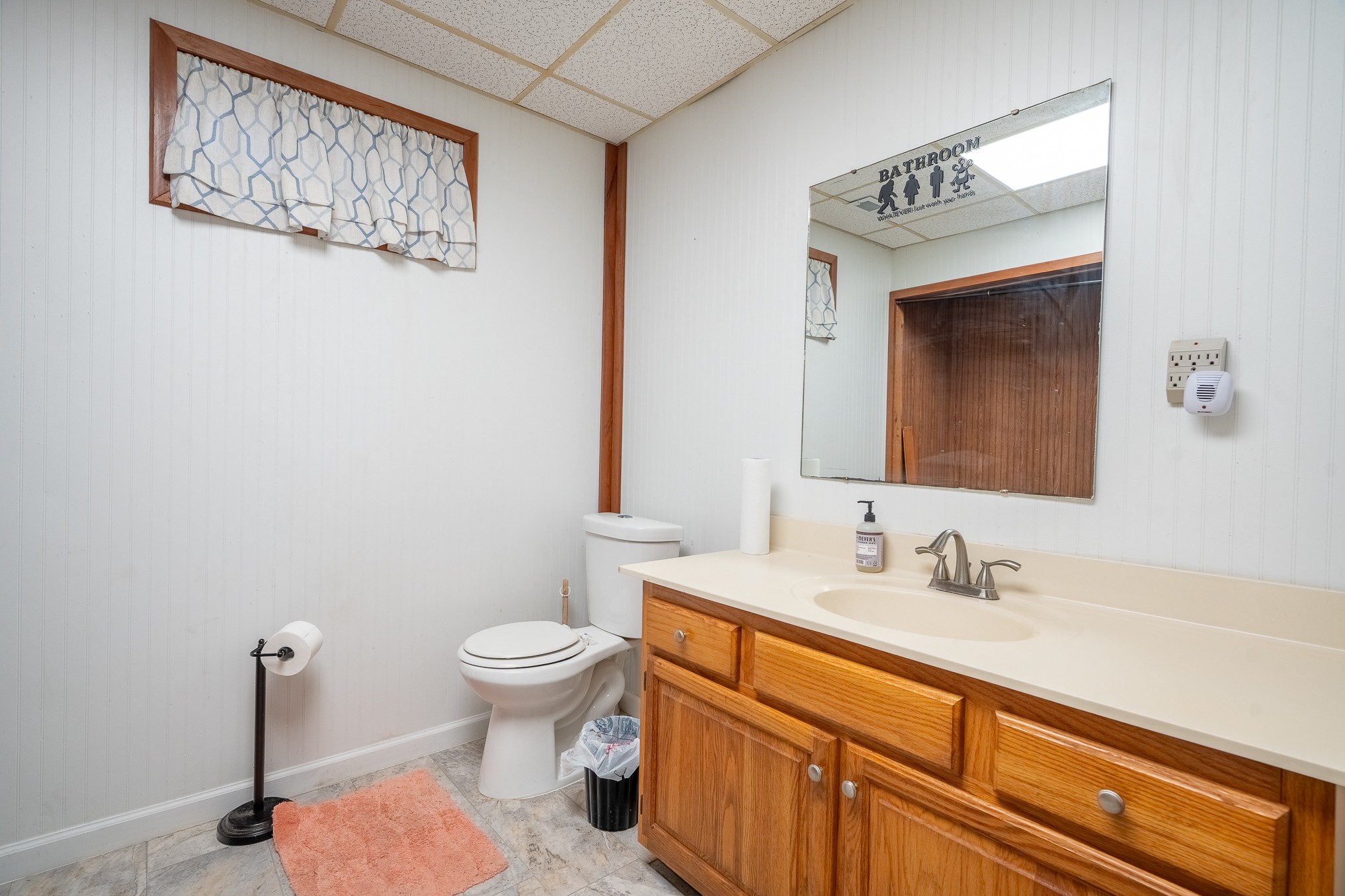 75 Buie Road Summertown, TN 38483 - Photo 22 of 27 a bathroom with a sink a toilet and mirror