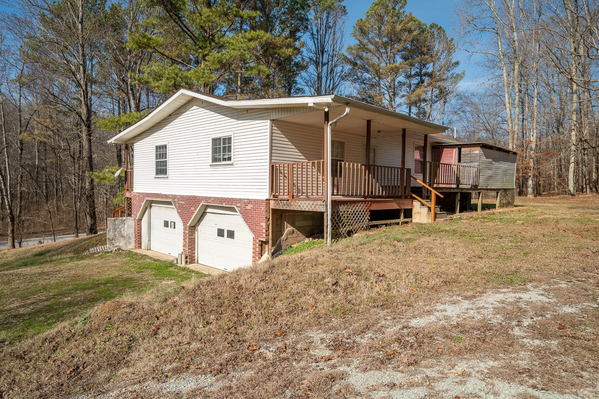 75 Buie Road Summertown, TN 38483 - Photo 3 of 27 a view of a house with a yard covered in snow