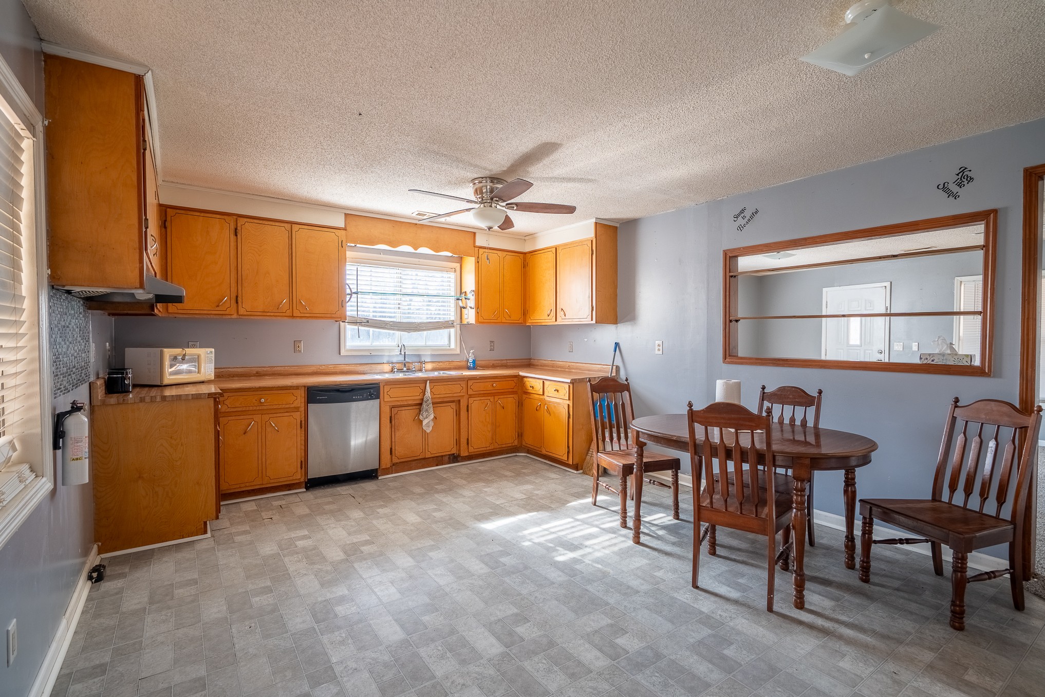 75 Buie Road Summertown, TN 38483 - Photo 7 of 27 a kitchen with table chairs sink and cabinets