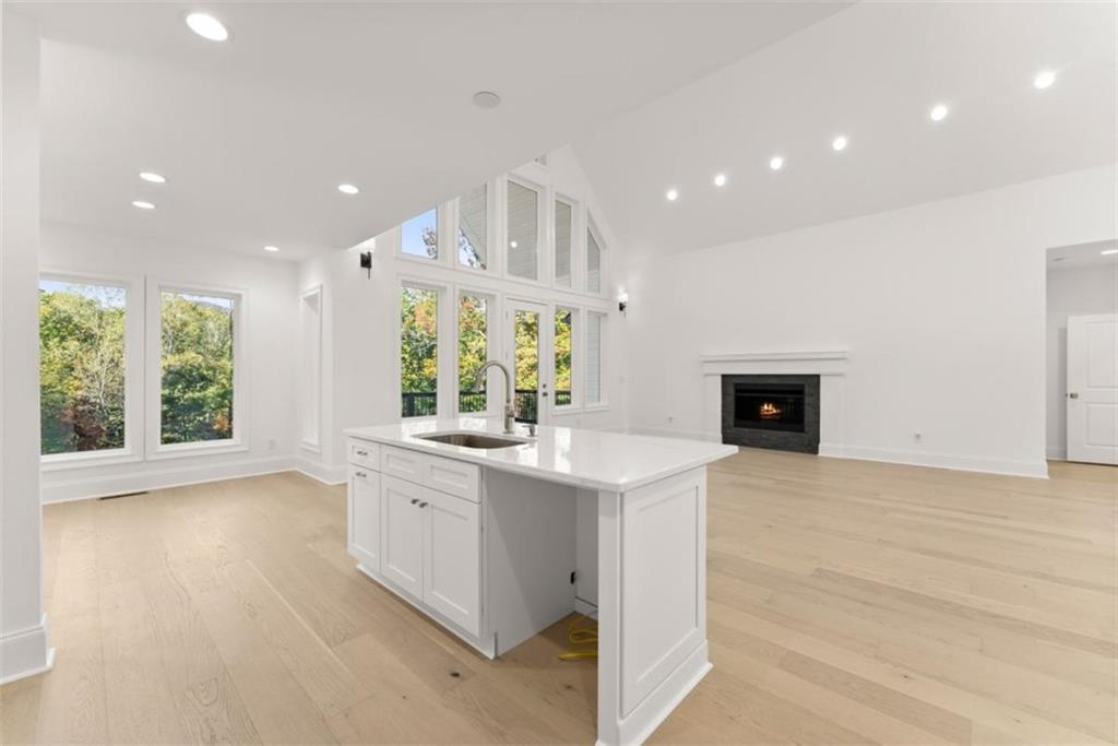 2123 Goat Neck Road Cleveland, GA 30528 - Photo 20 of 66 a large kitchen with kitchen island a sink stainless steel appliances and cabinets