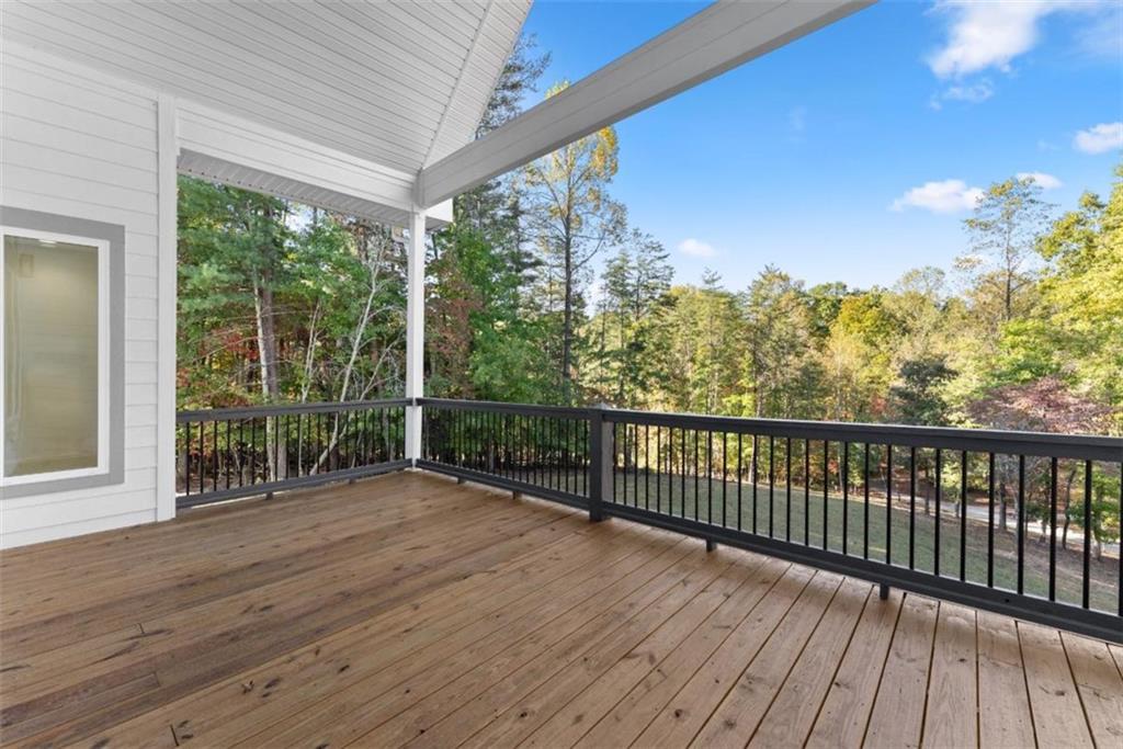 2123 Goat Neck Road Cleveland, GA 30528 - Photo 21 of 66 a view of a balcony with wooden floor