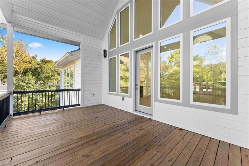 2123 Goat Neck Road Cleveland, GA 30528 - Photo 23 of 66 a view of an empty room with wooden floor and a window