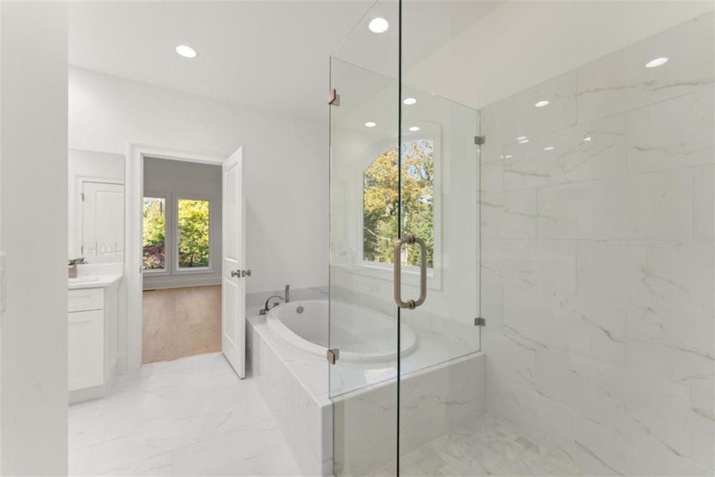 2123 Goat Neck Road Cleveland, GA 30528 - Photo 37 of 66 a bathroom with a bathtub and a shower