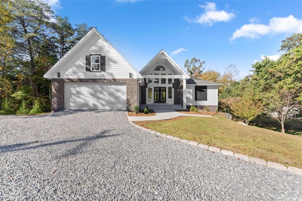 2123 Goat Neck Road Cleveland, GA 30528 - Photo 5 of 66 a front view of a house with a yard