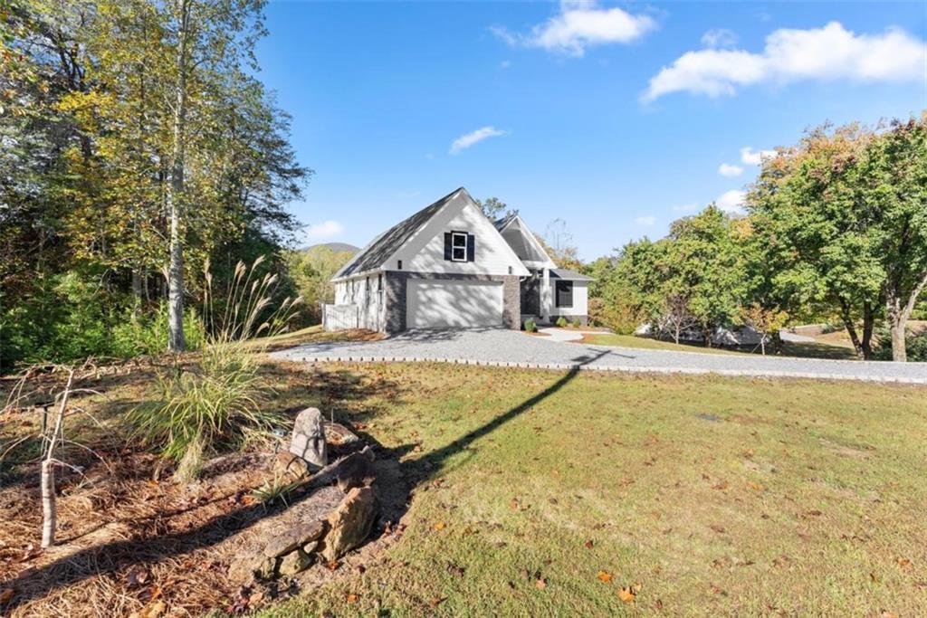 2123 Goat Neck Road Cleveland, GA 30528 - Photo 8 of 66 a view of a house with a yard