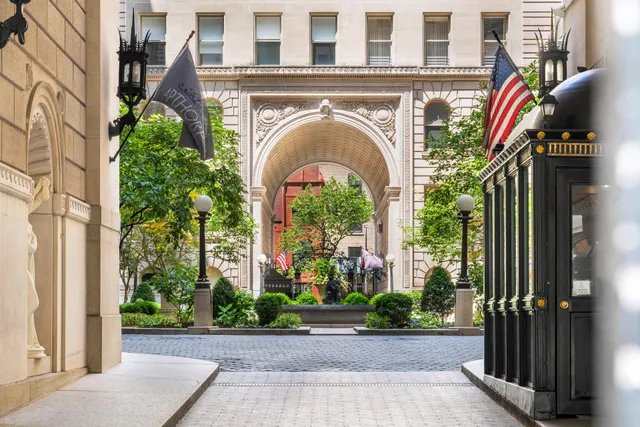 a front view of a building with garden