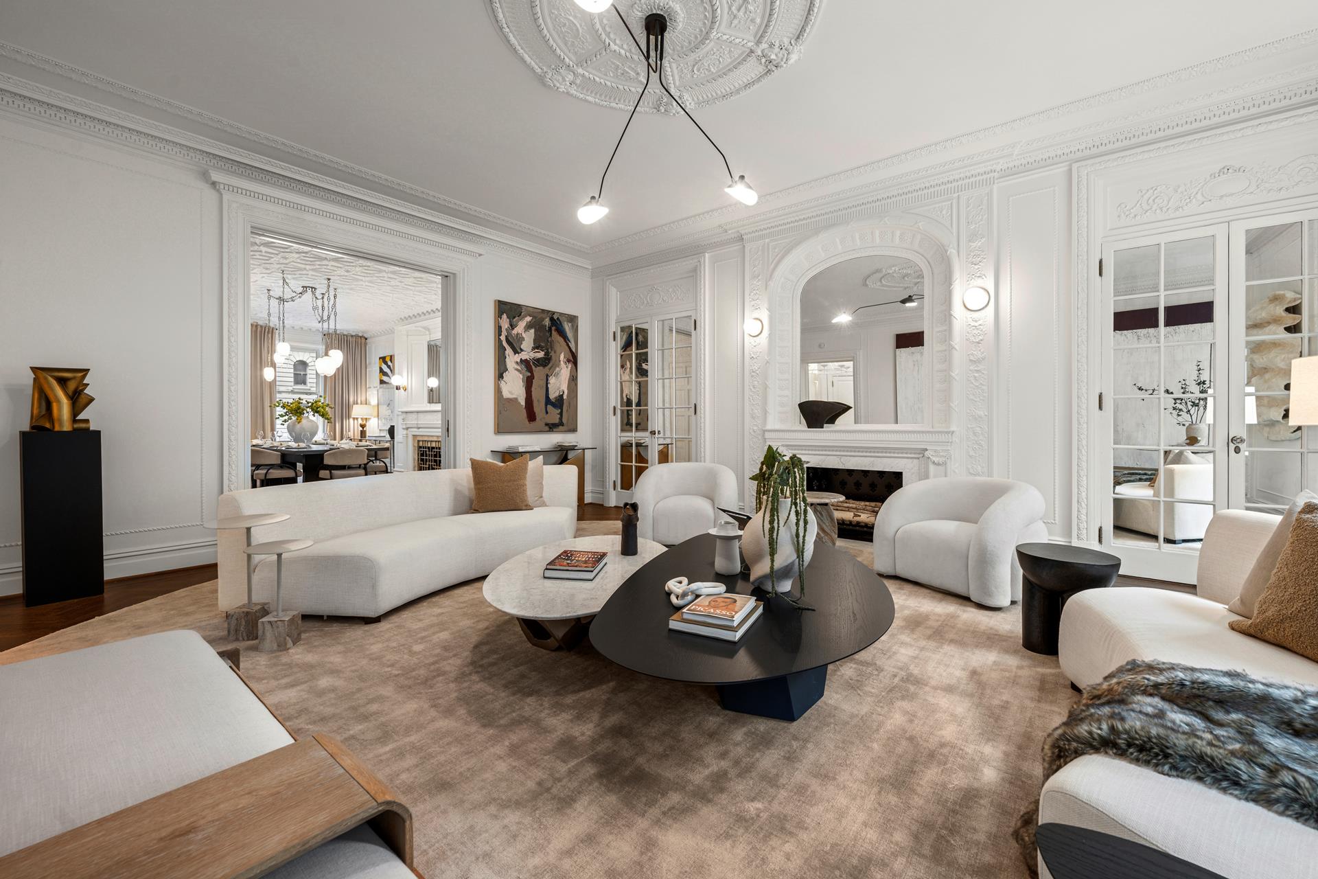 390 West End Avenue, Unit 2A Manhattan, NY 10024 - Photo 8 of 27 a living room with furniture and a chandelier