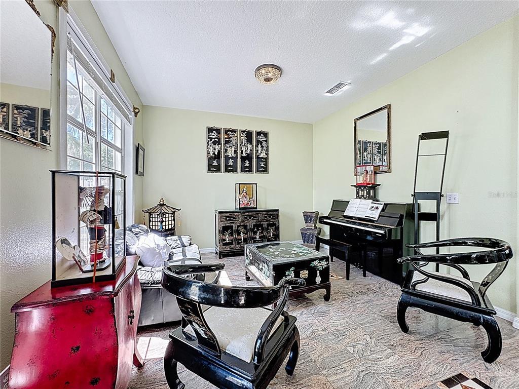 2048 Applegate Drive Ocoee, FL 34761 - Photo 13 of 61 a view of a workspace with furniture