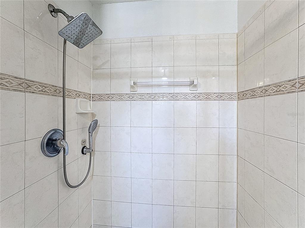 2048 Applegate Drive Ocoee, FL 34761 - Photo 61 of 61 a bathroom with a shower