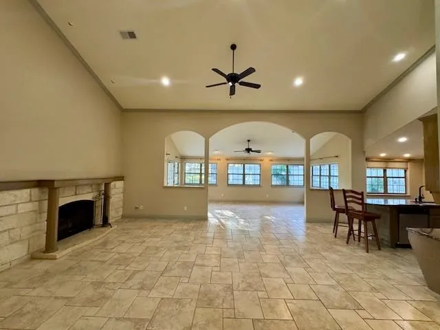 a view of a livingroom with furniture and a fireplace