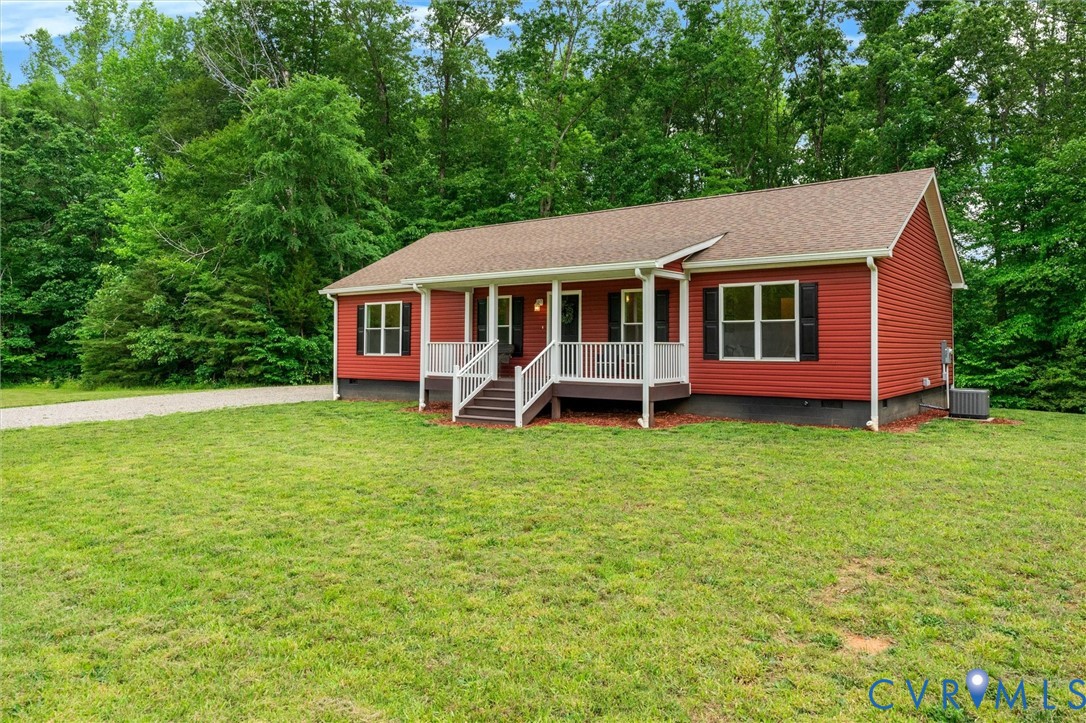 5239 Old Buckingham Road Powhatan, VA 23139 - Photo 11 of 50 a view of a house with a backyard
