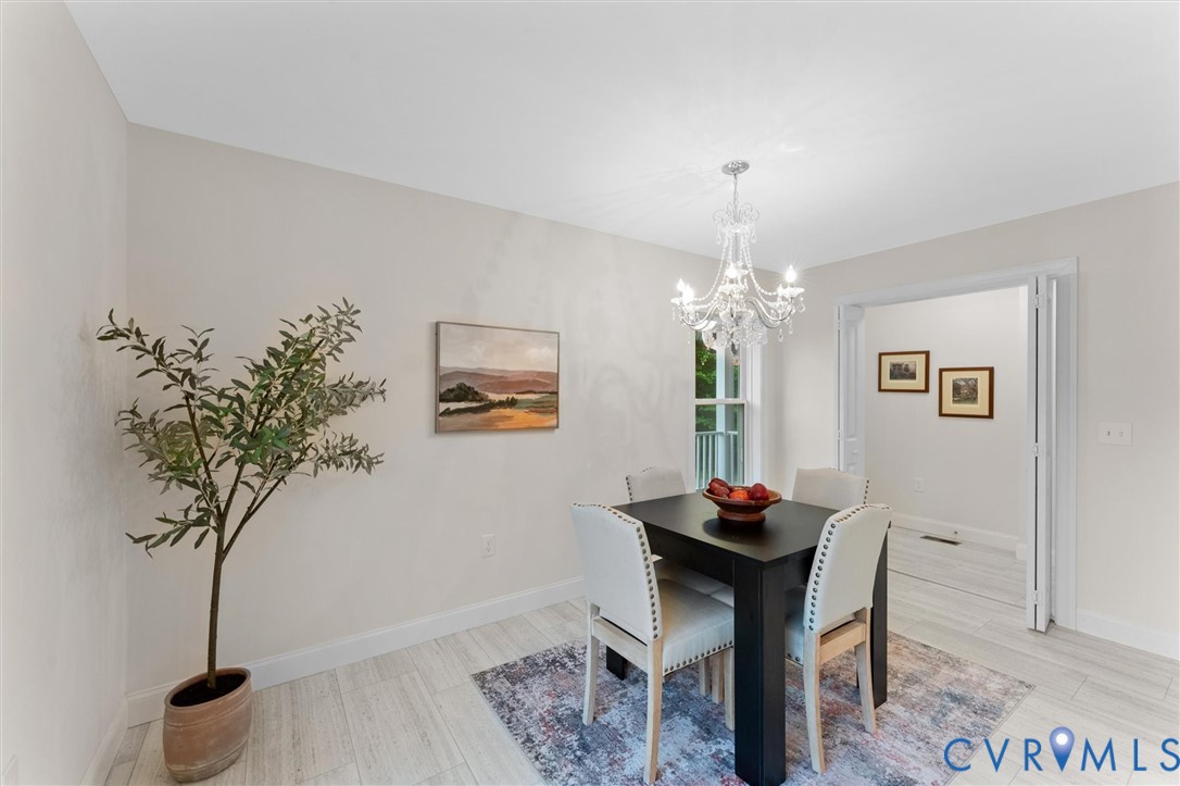 5239 Old Buckingham Road Powhatan, VA 23139 - Photo 20 of 50 a living room with furniture and a potted plant