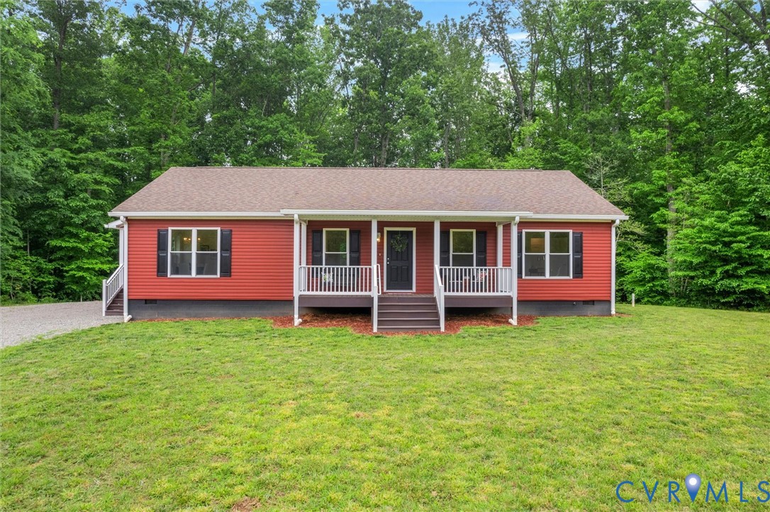 5239 Old Buckingham Road Powhatan, VA 23139 - Photo 2 of 50 a view of a house with a yard and sitting area
