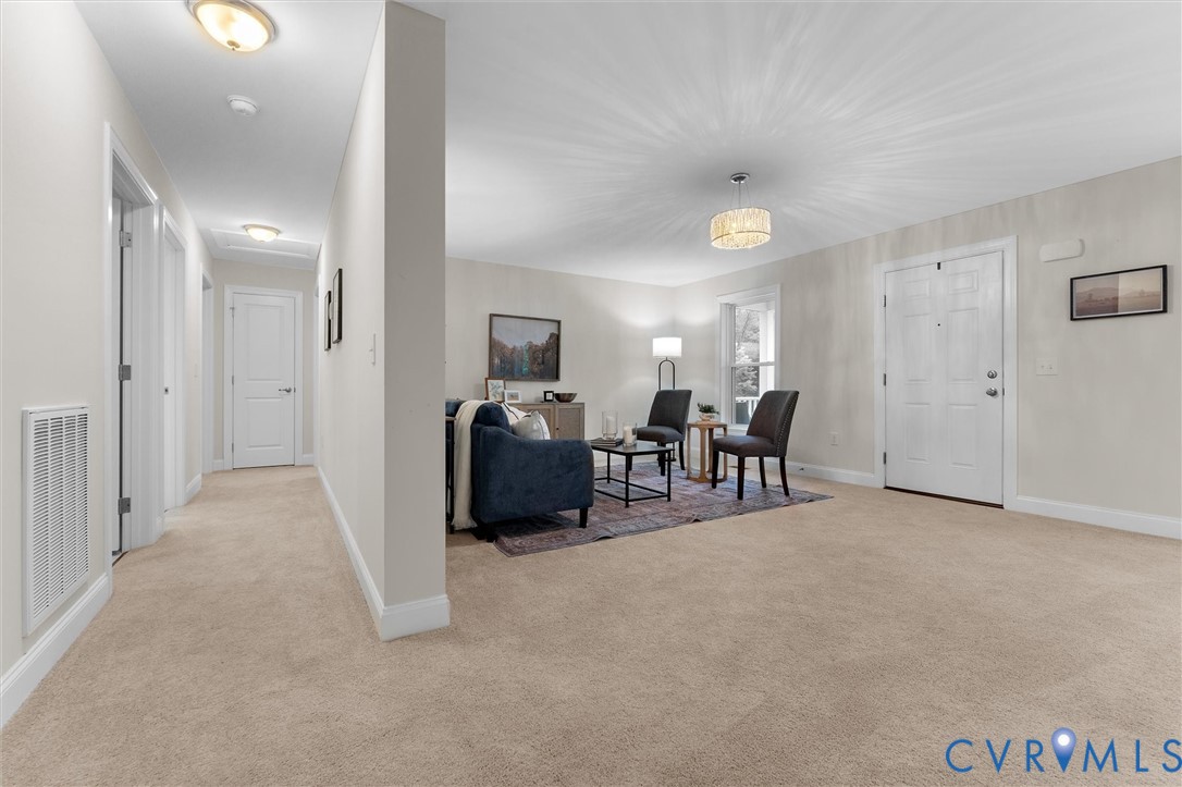 5239 Old Buckingham Road Powhatan, VA 23139 - Photo 26 of 50 a view of a livingroom with furniture and a flat screen tv