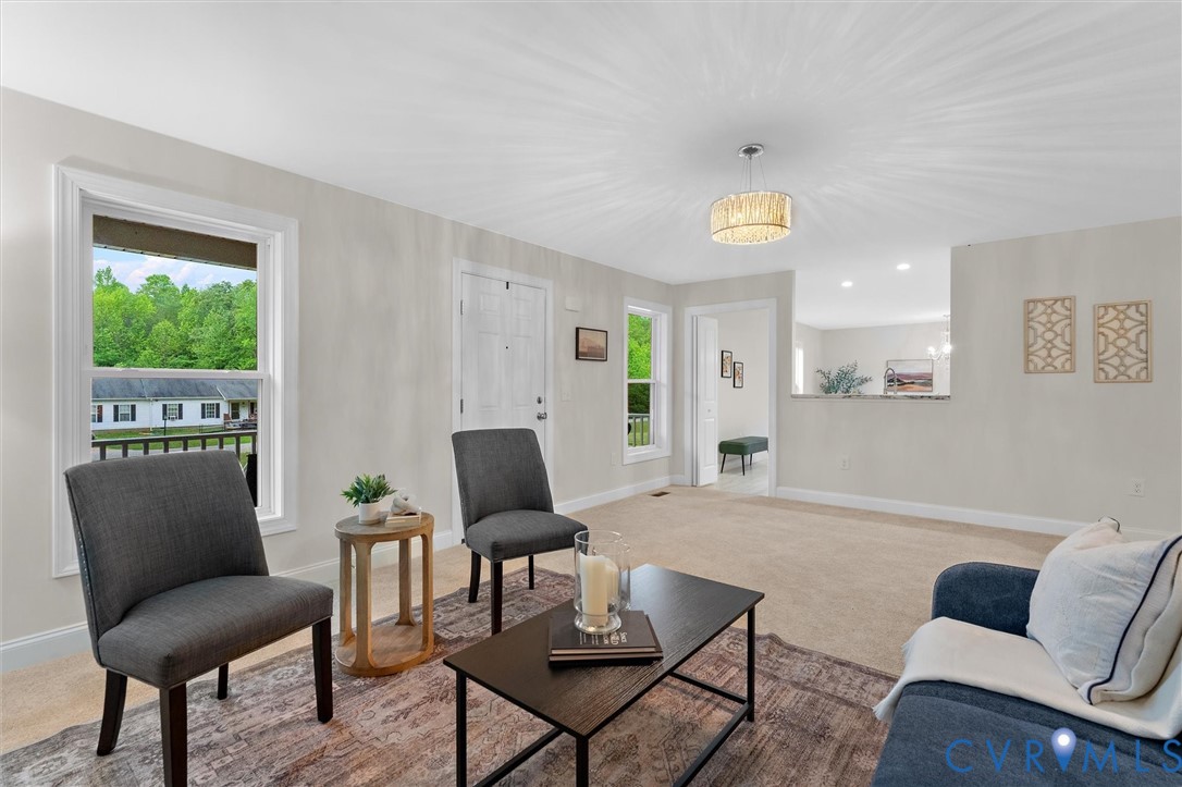 5239 Old Buckingham Road Powhatan, VA 23139 - Photo 31 of 50 a living room with furniture and a window