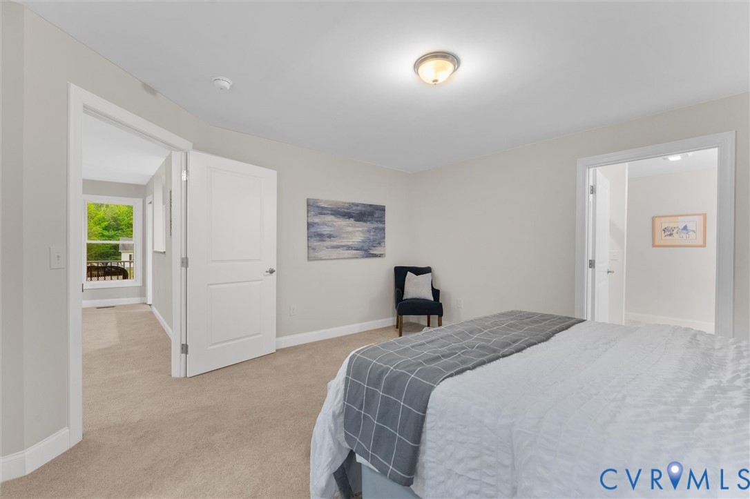 5239 Old Buckingham Road Powhatan, VA 23139 - Photo 34 of 50 a bedroom with a bed and a painting on the wall