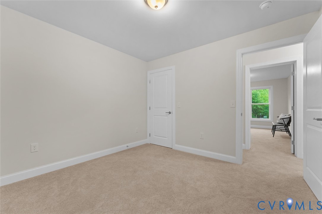 5239 Old Buckingham Road Powhatan, VA 23139 - Photo 45 of 50 a view of an empty room and a window