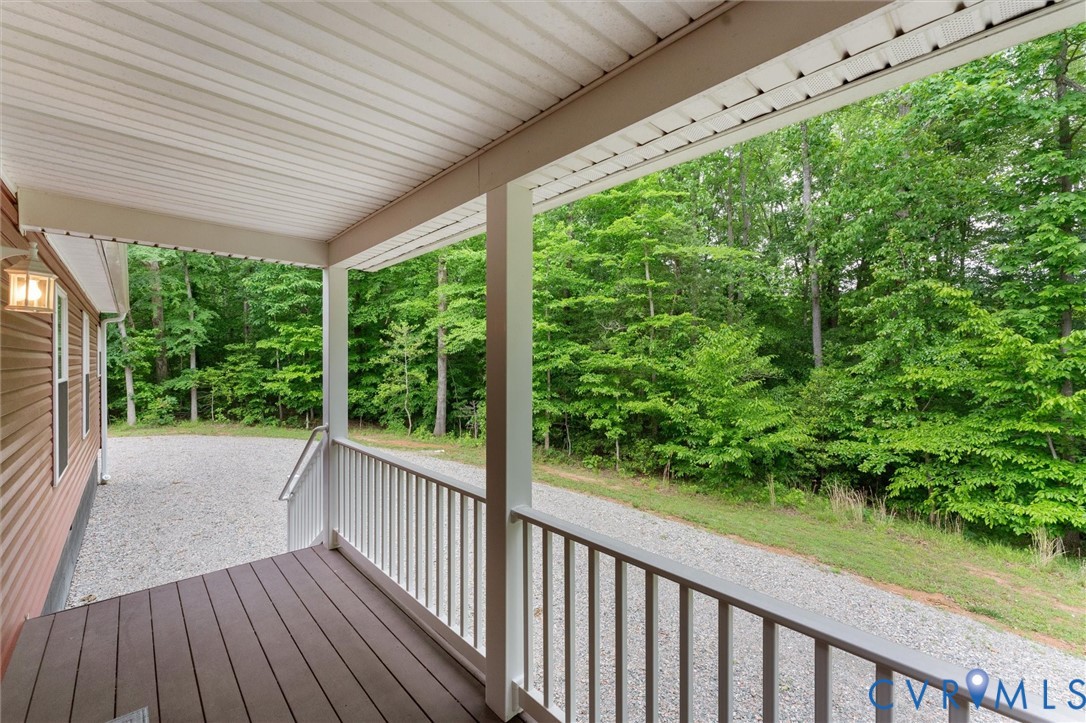 5239 Old Buckingham Road Powhatan, VA 23139 - Photo 46 of 50 a view of a porch with wooden floor in front of house