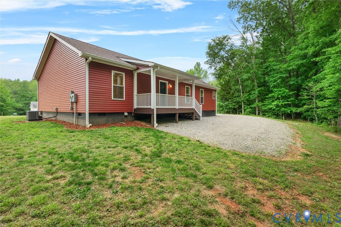 5239 Old Buckingham Road Powhatan, VA 23139 - Photo 48 of 50 a front view of a house with a yard