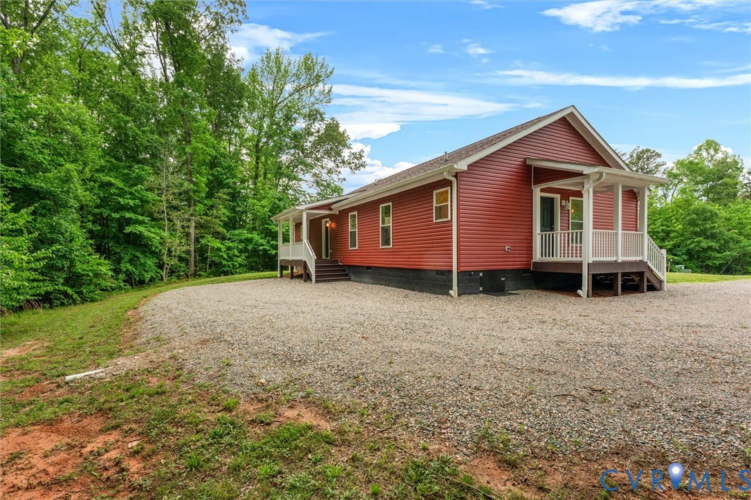 5239 Old Buckingham Road Powhatan, VA 23139 - Photo 50 of 50 a view of a house with a yard