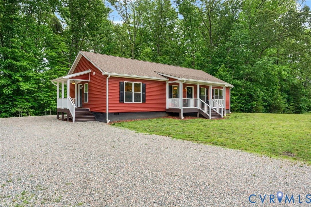 5239 Old Buckingham Road Powhatan, VA 23139 - Photo 9 of 50 a front view of house with yard and green space