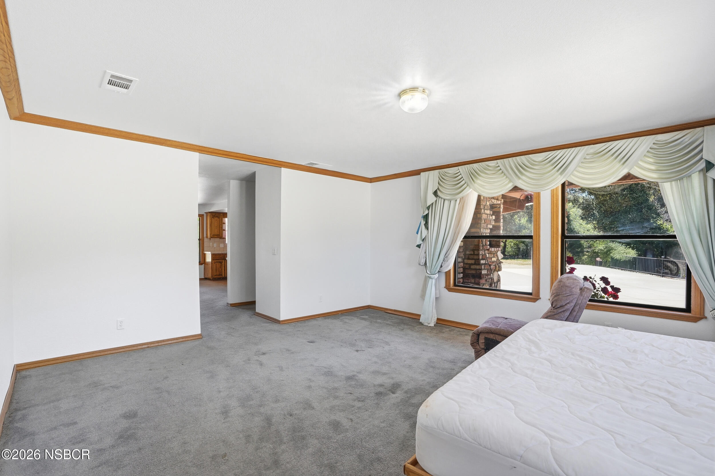 140 East Rice Ranch Road Santa Maria, CA 93455 - Photo 17 of 44 a view of an empty room with a window