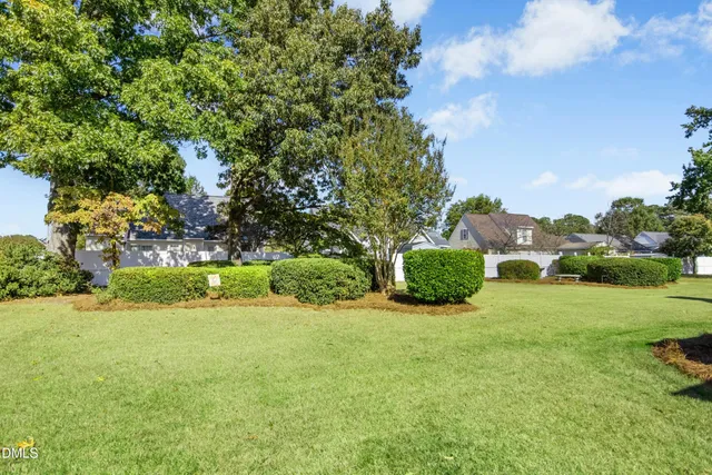 a picture of a bench in a white wall
