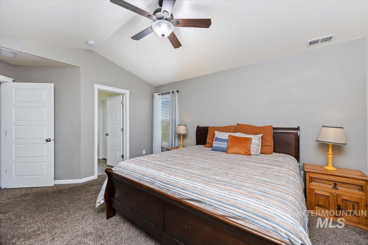 3813 North 2456 East Filer, ID 83328 - Photo 28 of 50 Carpeted bedroom featuring baseboards and a ceiling fan