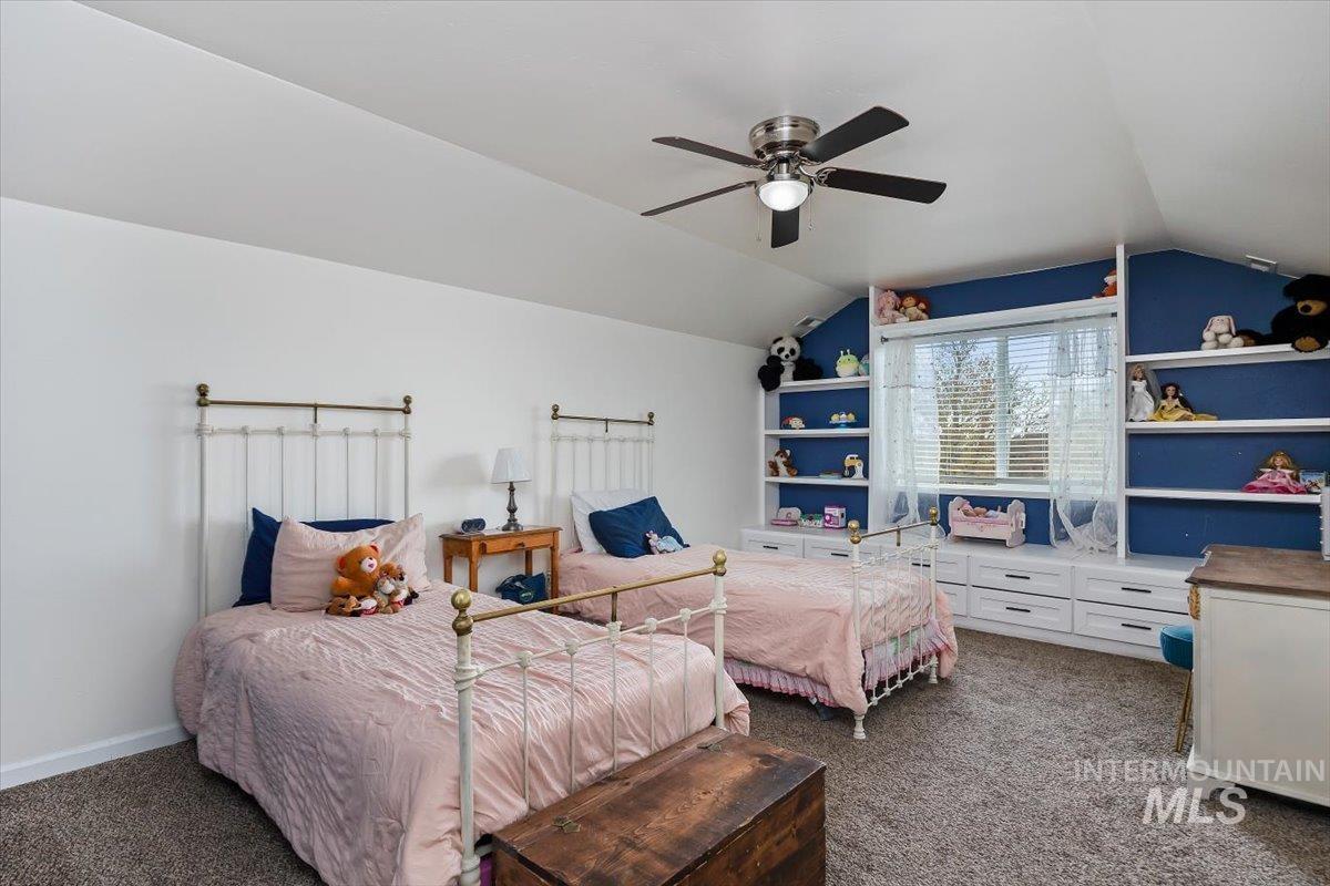 3813 North 2456 East Filer, ID 83328 - Photo 35 of 50 Bedroom featuring dark carpet and ceiling fan