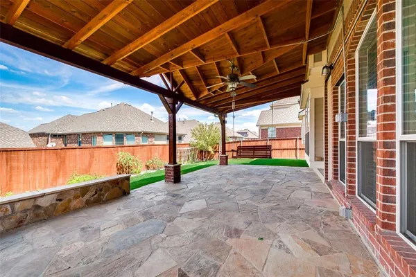 a view of a backyard of a house