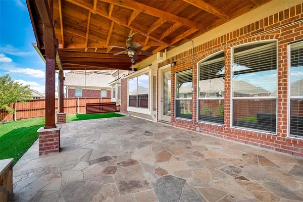 a view of yard with porch