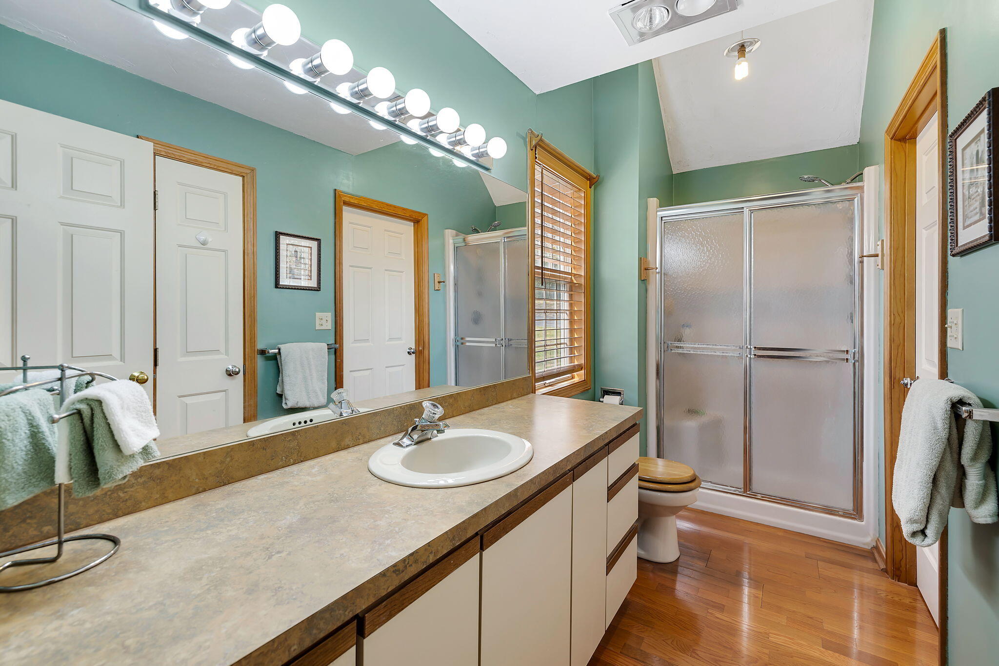 5 Vista Circle Centerville, MA 02632 - Photo 19 of 43 a spacious bathroom with a granite countertop sink a mirror and shower
