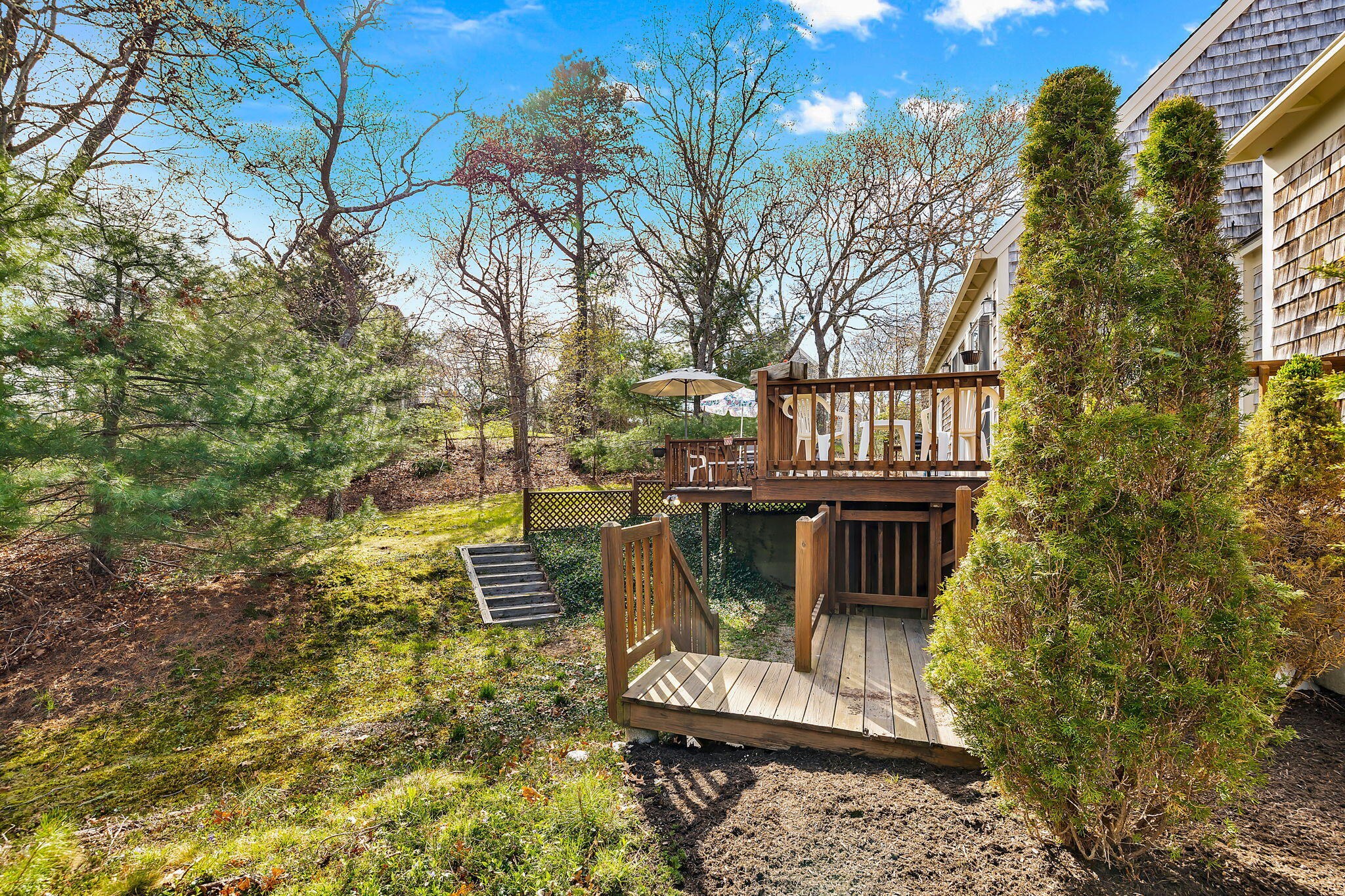 5 Vista Circle Centerville, MA 02632 - Photo 36 of 43 a front view of a house with a yard