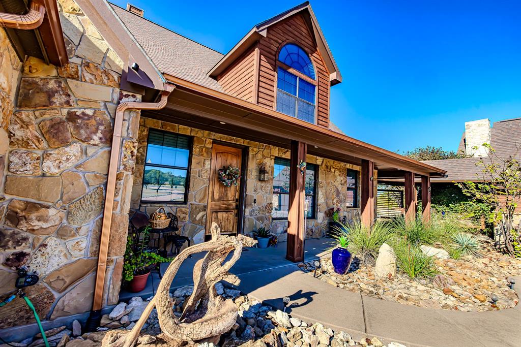 401 Frog Branch Court Graford, TX 76449 - Photo 4 of 40 a view of entryway with a outdoor space