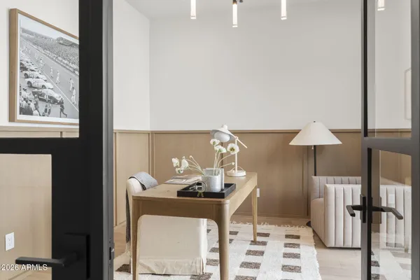 a kitchen with stainless steel appliances granite countertop a sink and cabinets