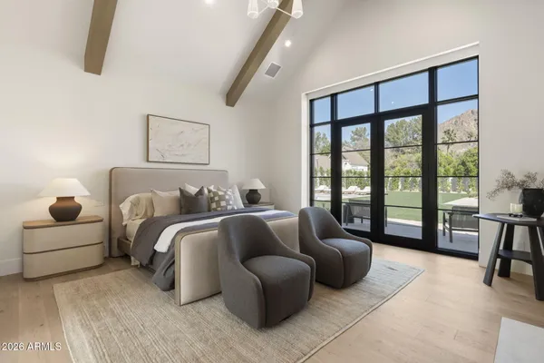 a balcony with furniture and a window