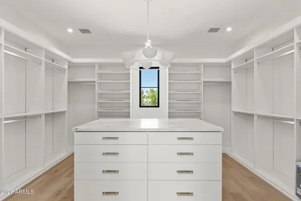 a kitchen with a cabinets and window